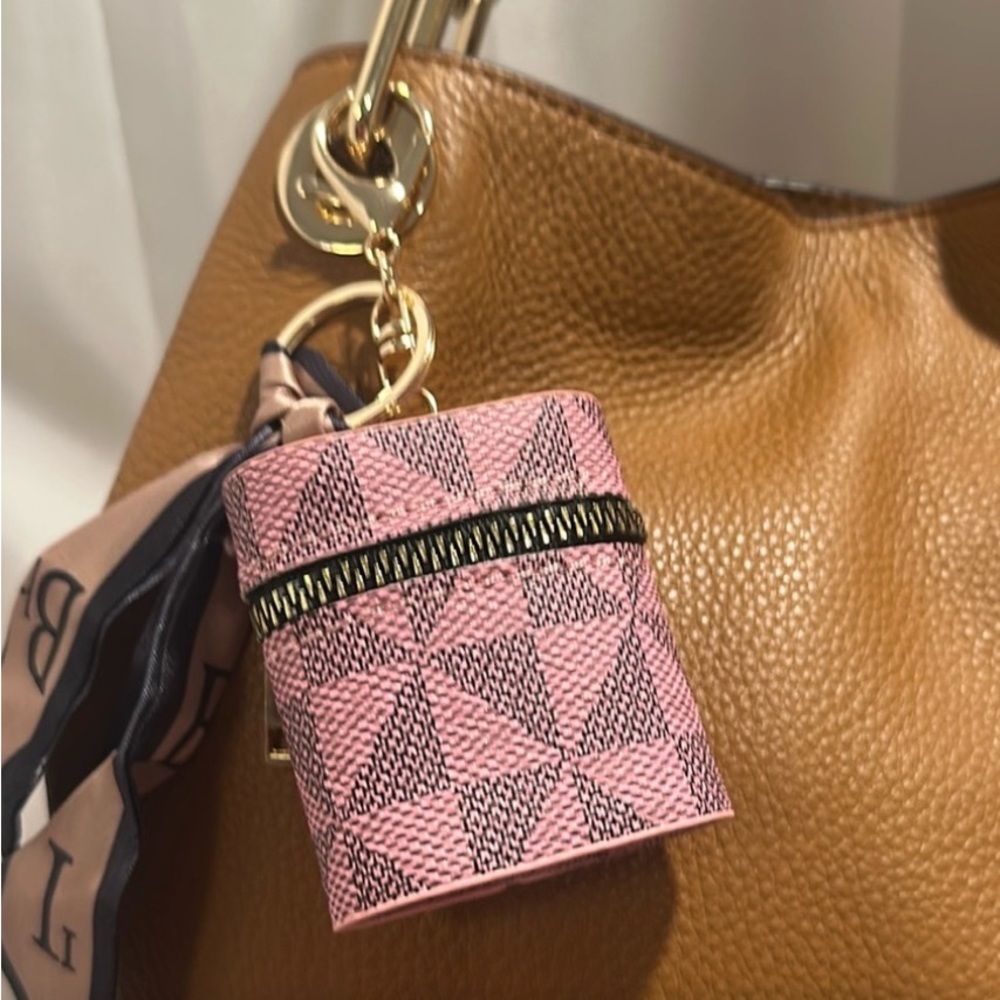 Pink and black Geometric Key & earbud holder NWOT